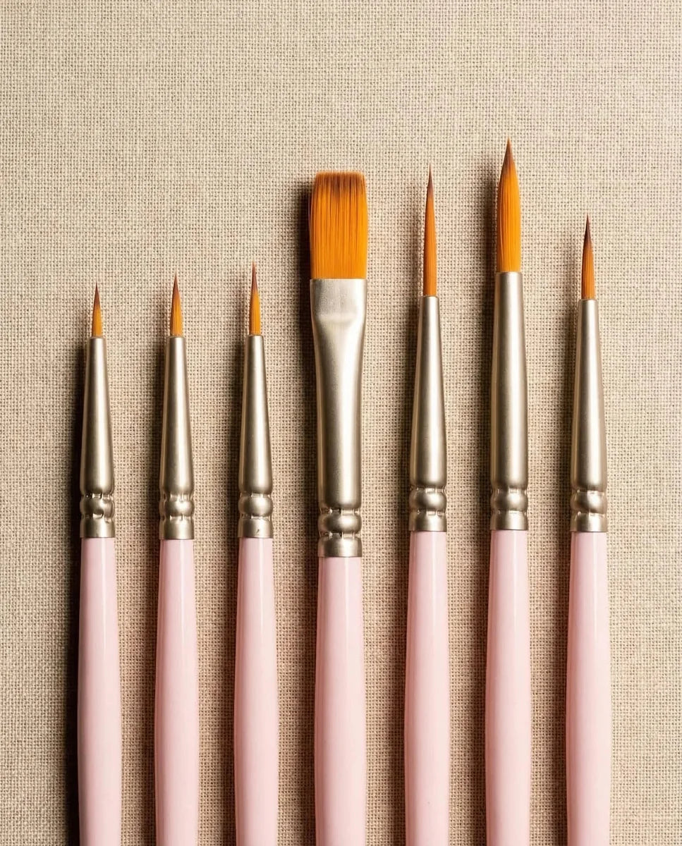 Paint by Numbers × SINOART brush set on a painting desk with canvas background