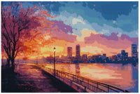 Thumbnail for Timanttimaalaus mallikuva – värikäs kaupunkimaisema joen rannalla, oranssin ja pinkin sävyinen auringonlasku sekä pastellinsininen taivas.