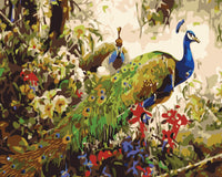 Thumbnail for Kaksi ylvästä riikinkukkoa rehevässä puutarhassa, toinen levittää värikästä pyrstöään kukkien ja vihreyden keskellä – paint by numbers -maalaus.
