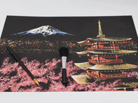 Thumbnail for valmiiksi raaputettu raaputuskuva jonka paalla on kyna ja harja