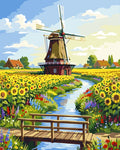 Thumbnail for Tuulimylly auringonkukkapellolla numeromaalaus. Puinen silta, kirkas taivas.