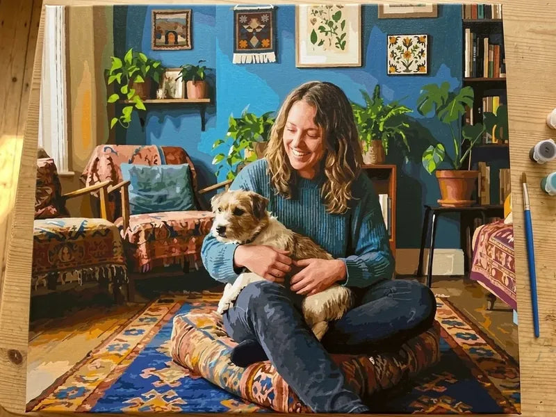 Valmis numeromaalaus naisesta ja koirasta olohuoneessa